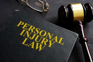 Personal Injury Law book and judge's gavel