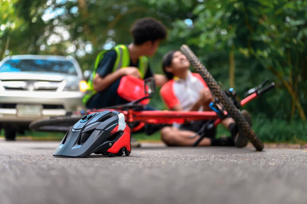 Bicycle Helmet on Street After Mountain Bike Accident Cyclist Falls