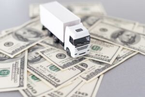 White truck lie on dollars