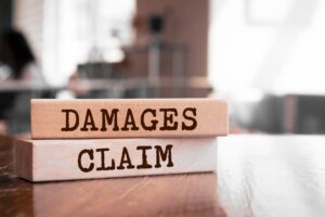 Damages & Claim Written Wooden Blocks