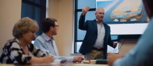 Mike ponder speaking to group